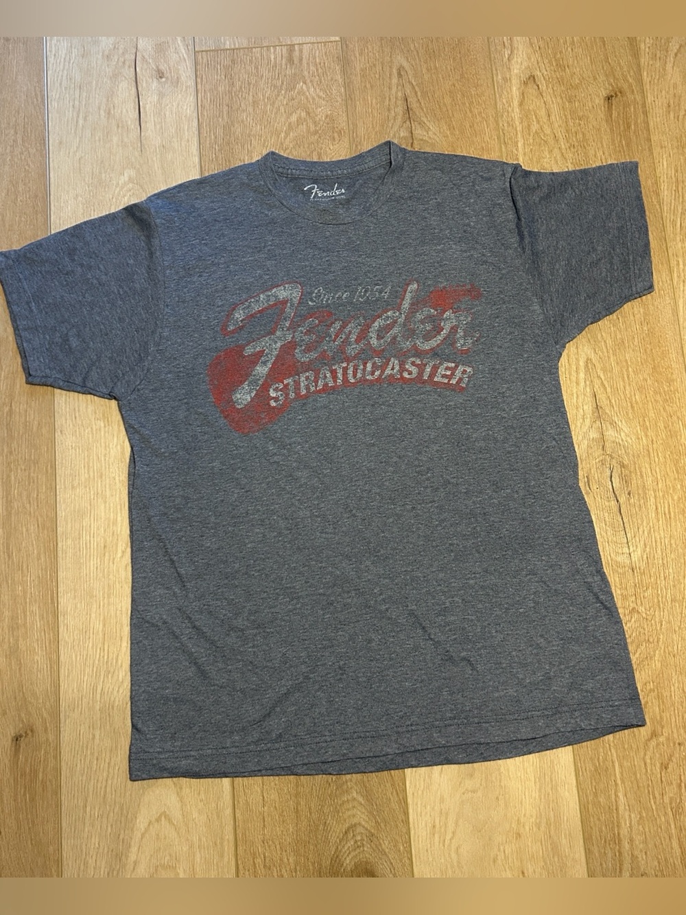 Vintage Style Fender Men’s large Light Blue Tee with Red Stratocaster Logo